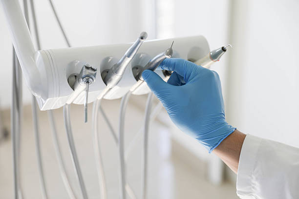 Professional Tooth Extraction technician working in Chester, WV